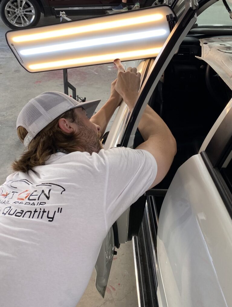 pdr specialist dallas removes the door ding and hail dents on this 4-runner