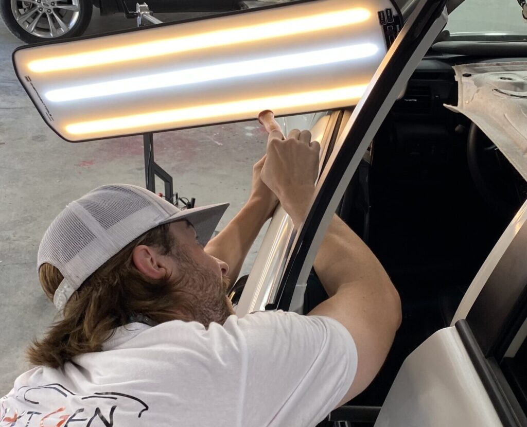pdr specialist dallas removes the door ding and hail dents on this 4-runner